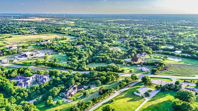 Aerial overview of property's location with a large body of water | Image 12