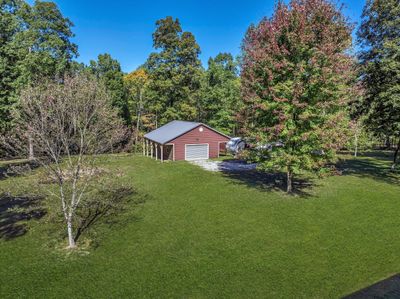 THE BACK YARD IS PURE BLISS... ***1.27 Acres+/-*** Green Grass Edits on Exterior Photos | Image 3