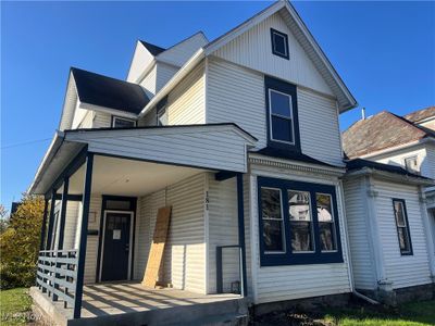 View of front of property featuring a porch | Image 1