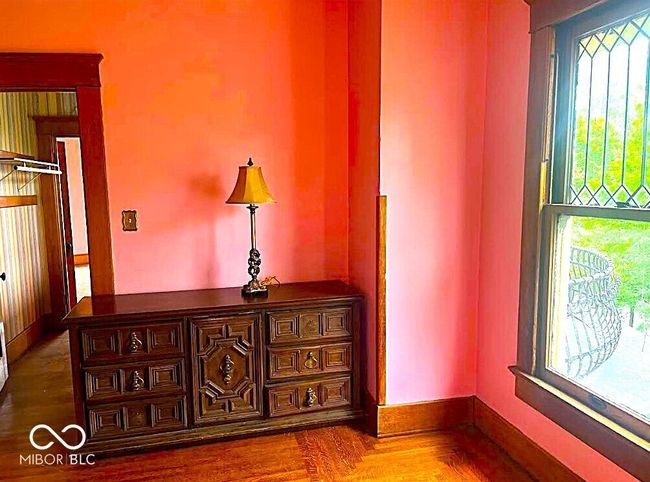 interior space with baseboards | Image 12