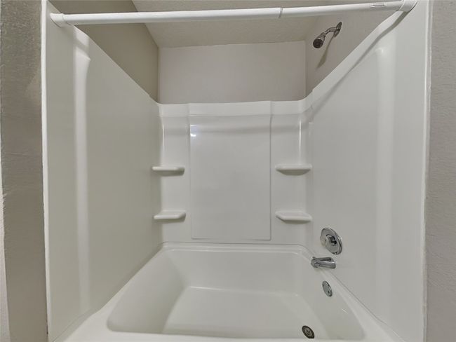 Full bathroom featuring shower / washtub combination | Image 13