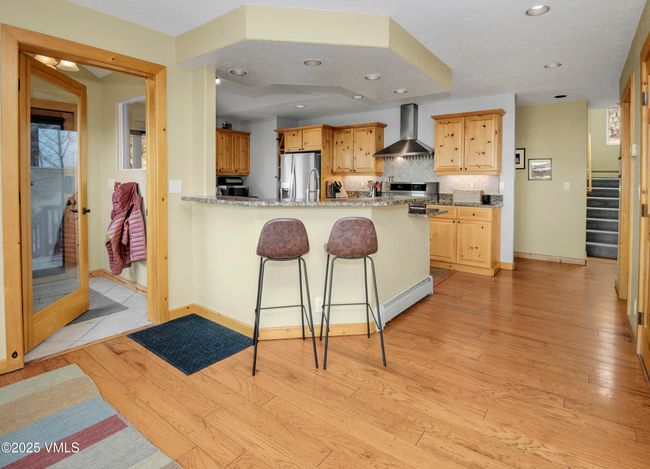 Kitchen and breakfast bar and entry | Image 10