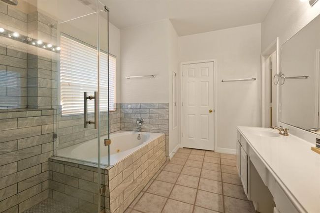 Your primary bathroom shower and bathtub surround was remodeled with custom tile work in 2024! | Image 12