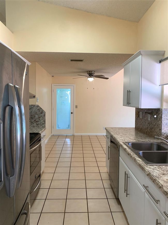 9840 Nw 28 Th Ct, House other with 4 bedrooms, 2 bathrooms and null parking in Coral Springs FL | Image 17