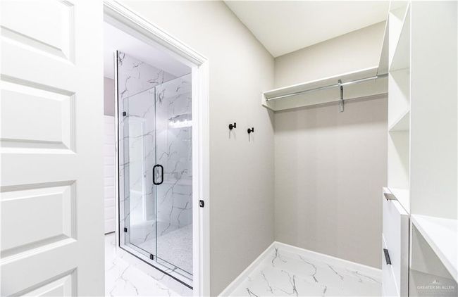 Primary Bedroom Walk In Closet | Image 16