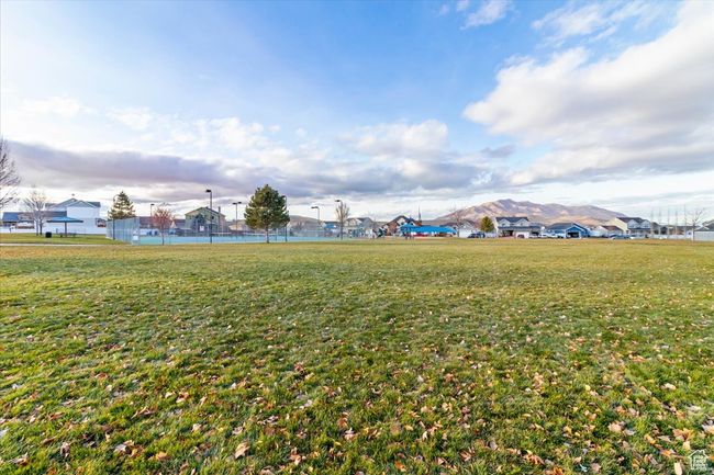 View of grassy yard featuring a residential view | Image 48