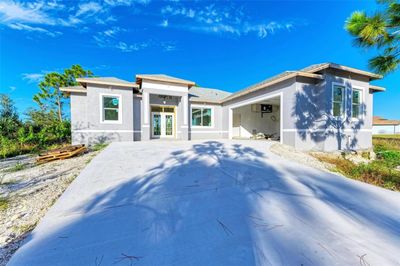 9555 Hallendale Drive, House other with 3 bedrooms, 2 bathrooms and null parking in Port Charlotte FL | Image 2