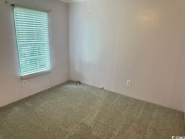 View of carpeted spare room | Image 24