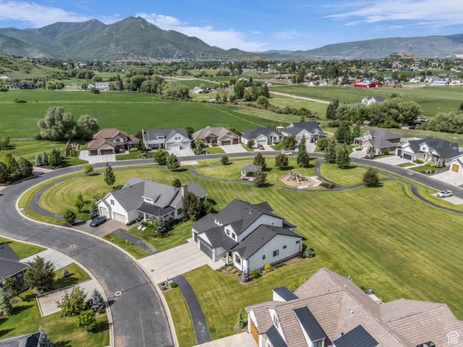 Aerial view of residential area featuring mountains | Image 60