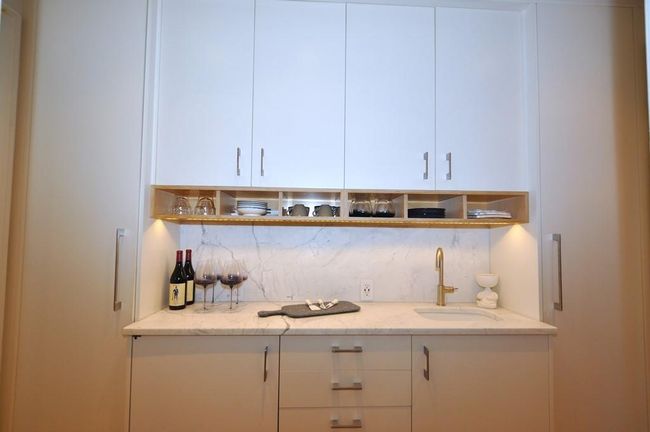 Butler Pantry has a working sink and hidden wine cooler. The Butler panty is between the Kitchen and dining room. | Image 13