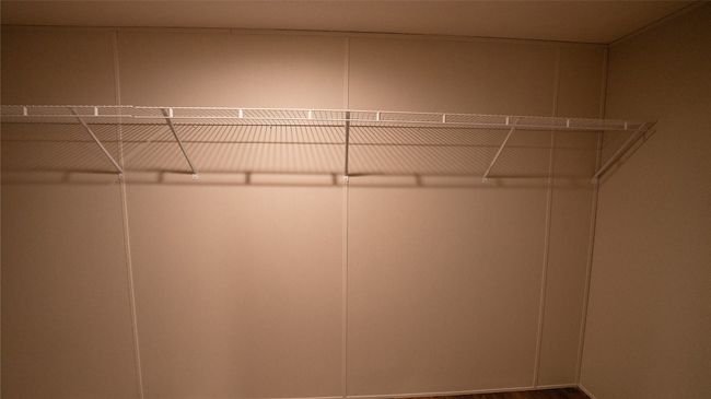 Spacious closet featuring wood finished floors | Image 10