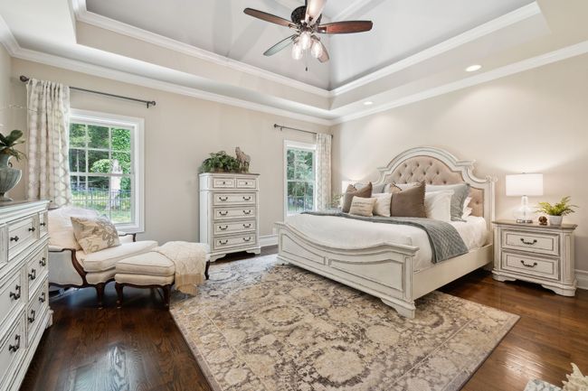 The Owner's Retreat - thoughtfully situated on the back of the home with peaceful views of the private back yard with wooded back drop. | Image 23
