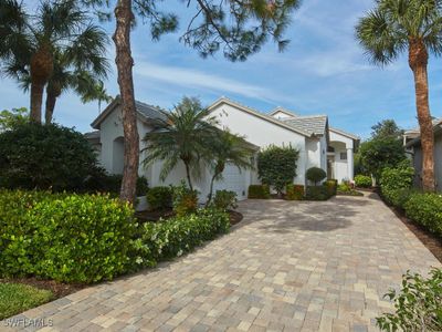 View of home's exterior with a garage | Image 1