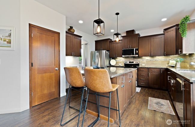 Ample cabinet and pantry space, ideal for meal prep and storage. | Image 7