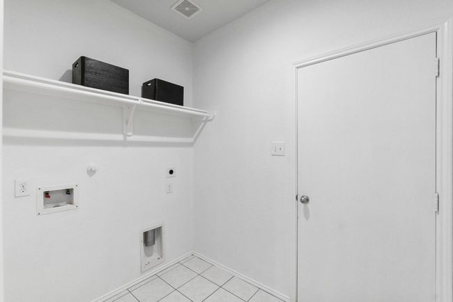 Laundry room with new flooring | Image 8