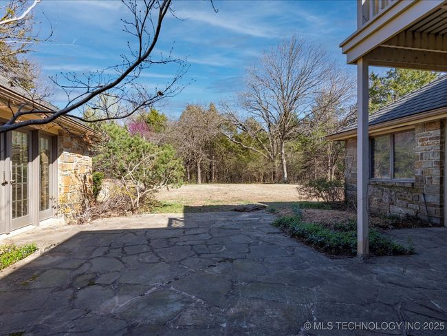 view from patio toward back yard | Image 49