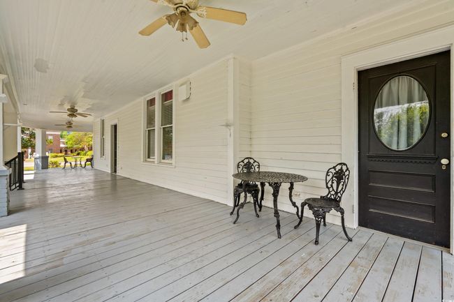 Porch featuring a ceiling fan | Image 35