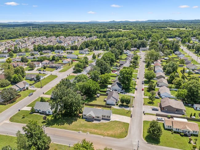 Nestled within a charming neighborhood, this property boasts a generous corner lot, providing ample space and privacy! 2095 Bolden Drive, Murfreesboro, TN 37127 | Image 25