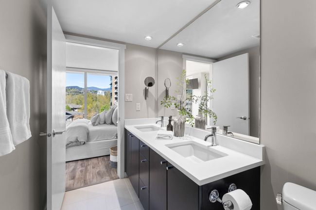 Ensuite bathroom with toilet, a sink, recessed lighting, and a mountain view | Image 14