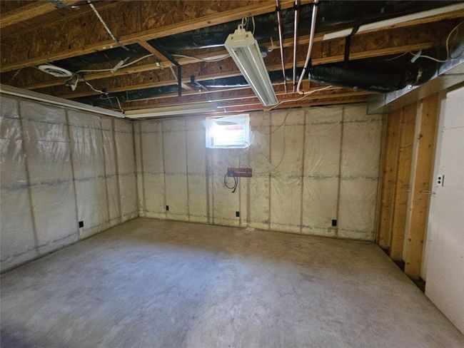 Interior of the attached extra room off the work shop. | Image 31