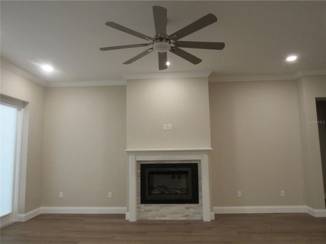 great room with electric fireplace | Image 14