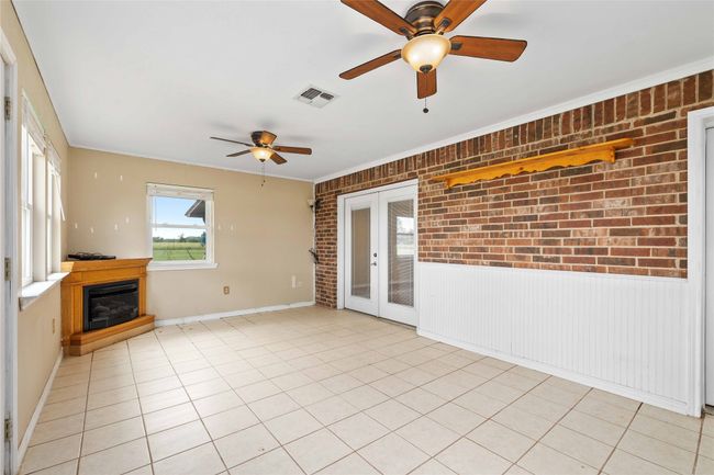 Unfurnished sunroom with french doors | Image 18