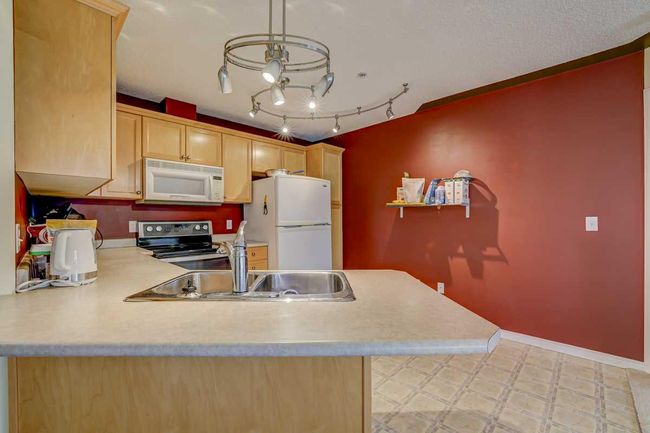 305 - 345 Rocky Vista Park Nw, Home with 2 bedrooms, 2 bathrooms and 1 parking in Calgary AB | Image 6