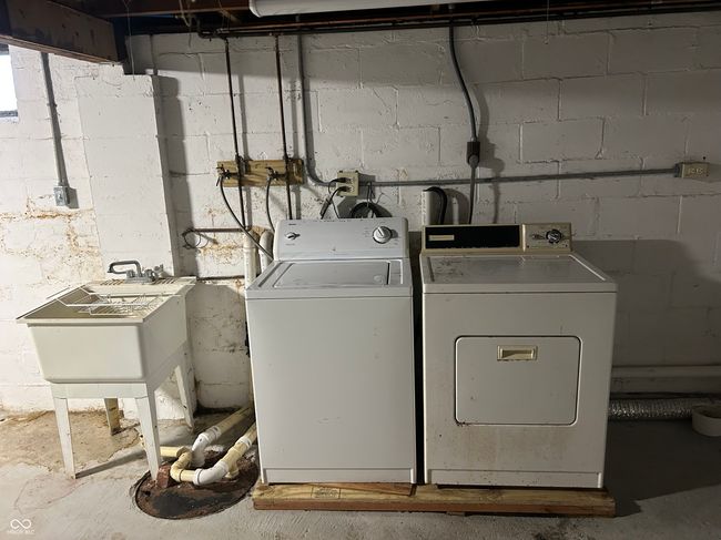 Washer and dryer stay. One of two sump pits. | Image 49