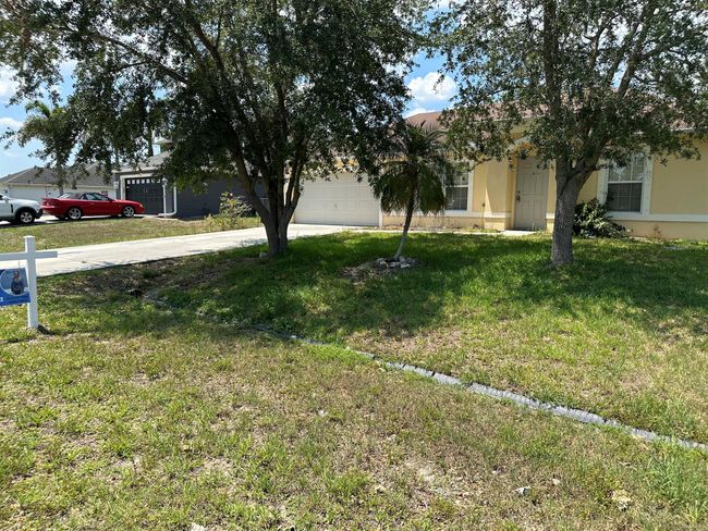 885 Sw Sultan Dr Drive, House other with 3 bedrooms, 2 bathrooms and null parking in Port St Lucie FL | Image 1