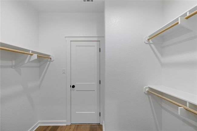 Spacious closet featuring wood-type flooring | Image 20