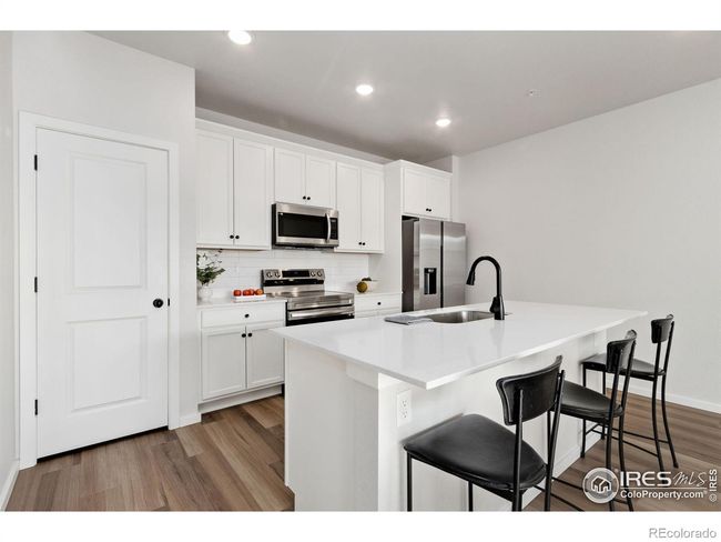 Kitchen Pantry, Kitchen Island with Breakfast Bar to sit and enjoy morning cup of coffee | Image 10