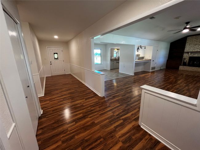 Across from the front door, the back entry brings you to the dreamy patio! | Image 13