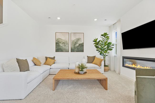 (Photo of model home, features will vary) The natural gathering space of the home, the Great Room is excellent for entertaining guests, hosting movie marathons and relaxing with loved ones, paired with the simplicity of a free-flowing design. | Image 7