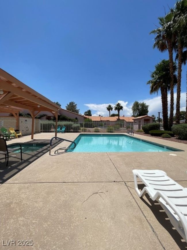 Community pool featuring a patio area | Image 33