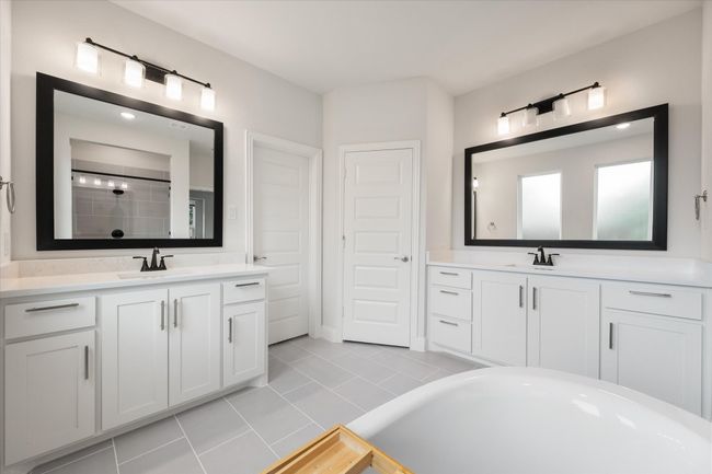 Primary bath also has separate vanities. | Image 25