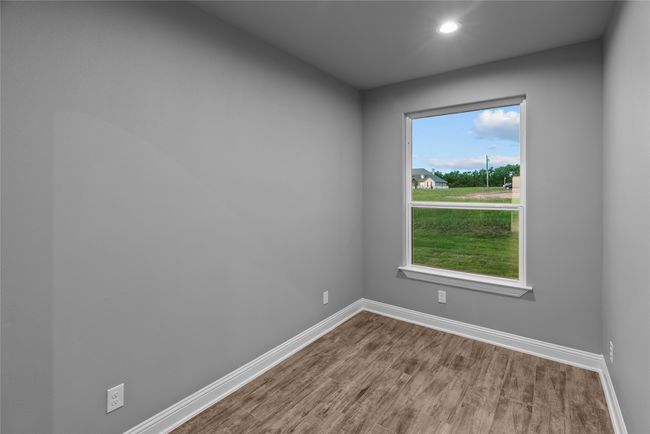 Empty room featuring wood finished floors and recessed lighting | Image 18