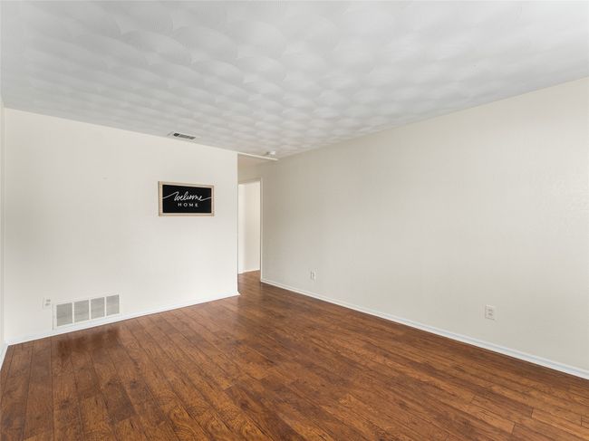 Entry living room featuring hardwood / wood-style flooring | Image 8