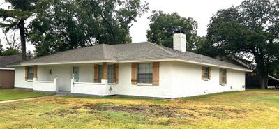 View of front facade featuring a front lawn | Image 2