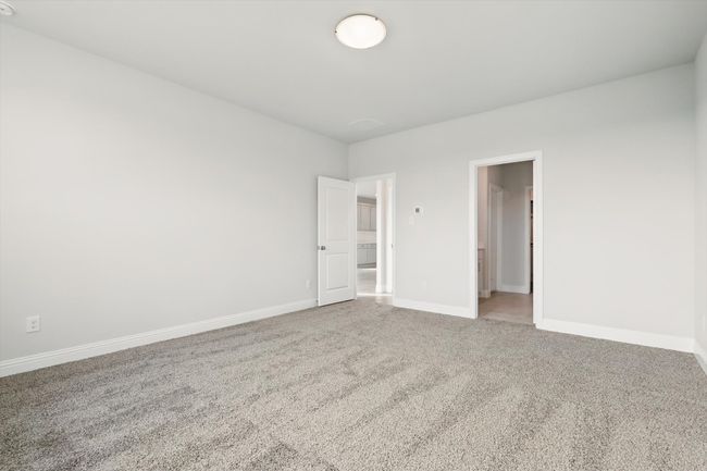 Beautiful Primary bedroom with great views to the back patio | Image 10
