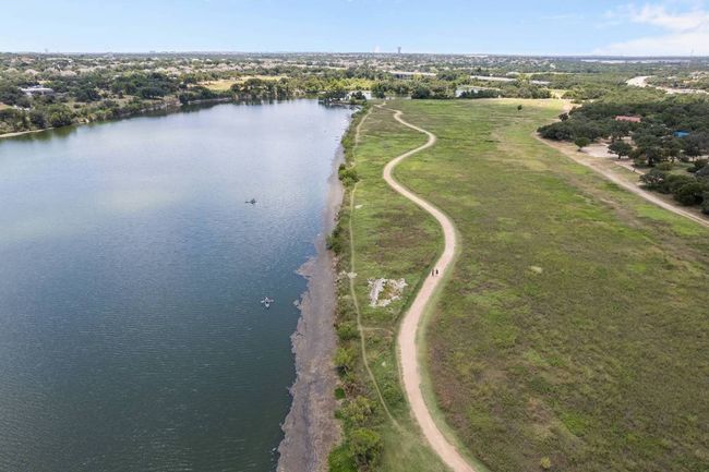 The community lies directly next to the scenic Brushy Creek Lake Park, which offers over 7 miles of hiking and separate mountain biking trails, a sparkling lake for fishing and kayaking, sand volleyball courts, playgrounds, and more. | Image 38