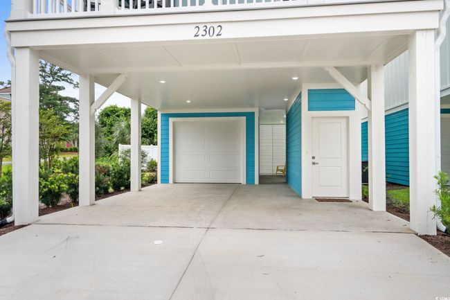 Garage with driveway | Image 6