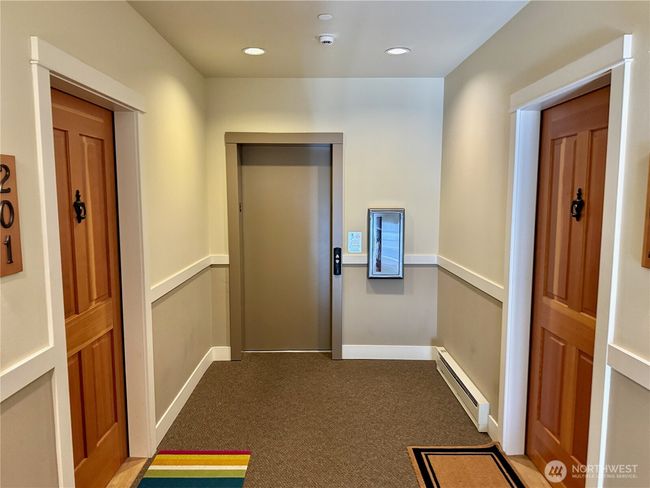 There are no shared walls. The home has a secure lobby and elevator from the front door to the parking garage and storage closet. | Image 18