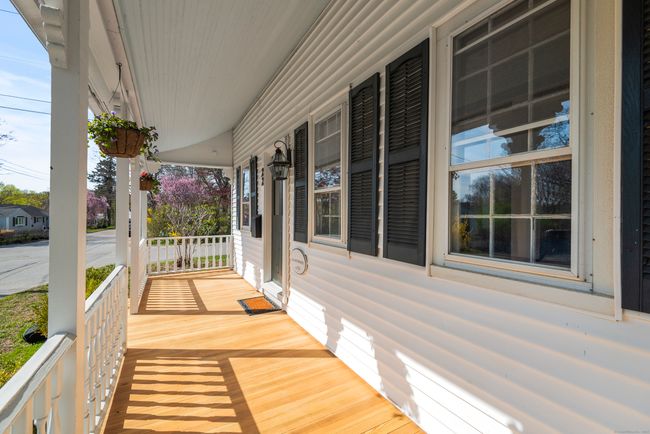 Charming front covered deck | Image 4