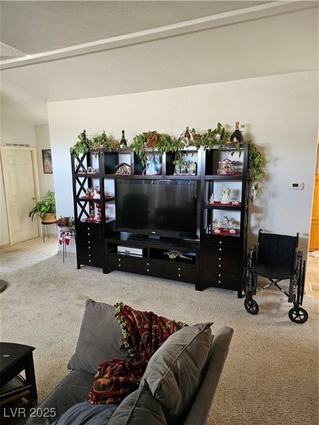 Living area featuring carpet flooring | Image 11