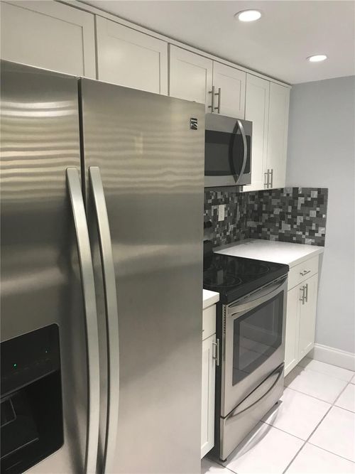 9-f-9576 Sw 1st Ct, Coral Springs, FL, 33071-7396 | Card Image