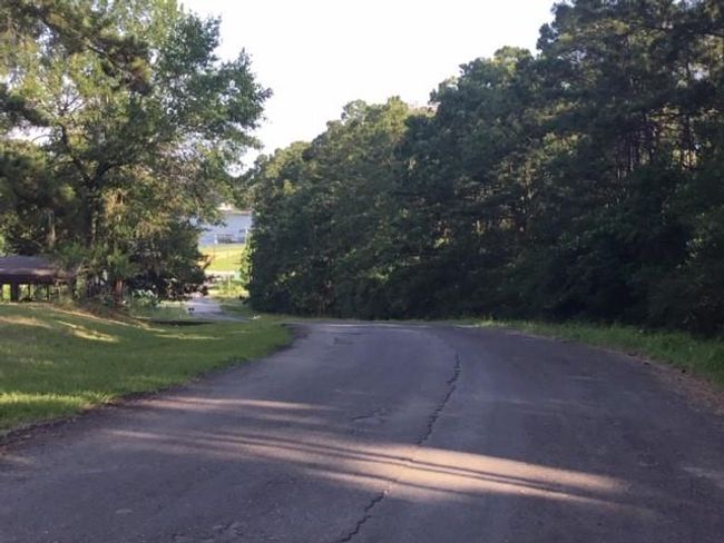 This tract runs down the road offering water views | Image 6