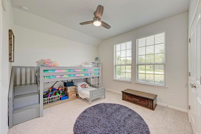 This secondary bedroom overlooks the front yard and is located to the Right of the foyer as you enter the home. | Image 30