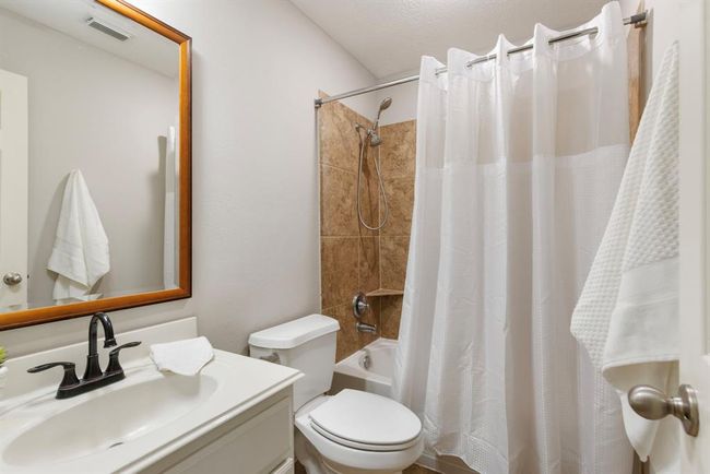 Full bathroom adjacent first floor secondary room conveniently located in hall convenient to all main areas. | Image 24