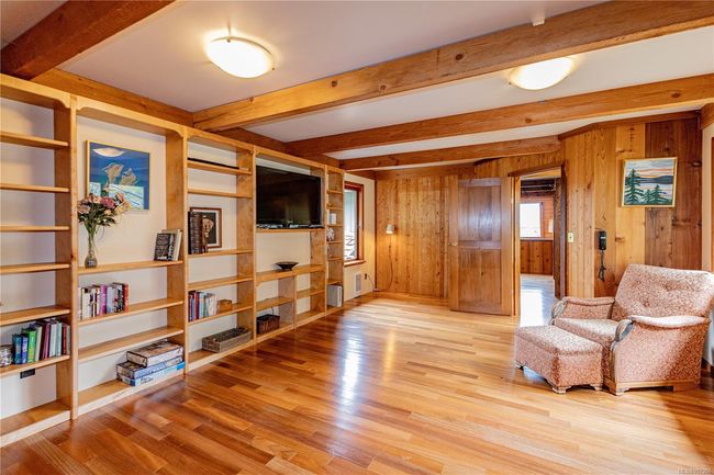 Family room with murphy bed and entrance to the outdoor, screened sleeping loft | Image 54