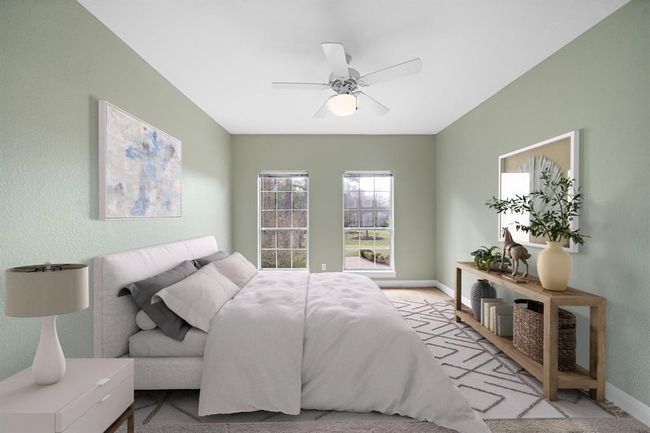 Second of three upstairs bedrooms also looks onto the front of the estate. | Image 35